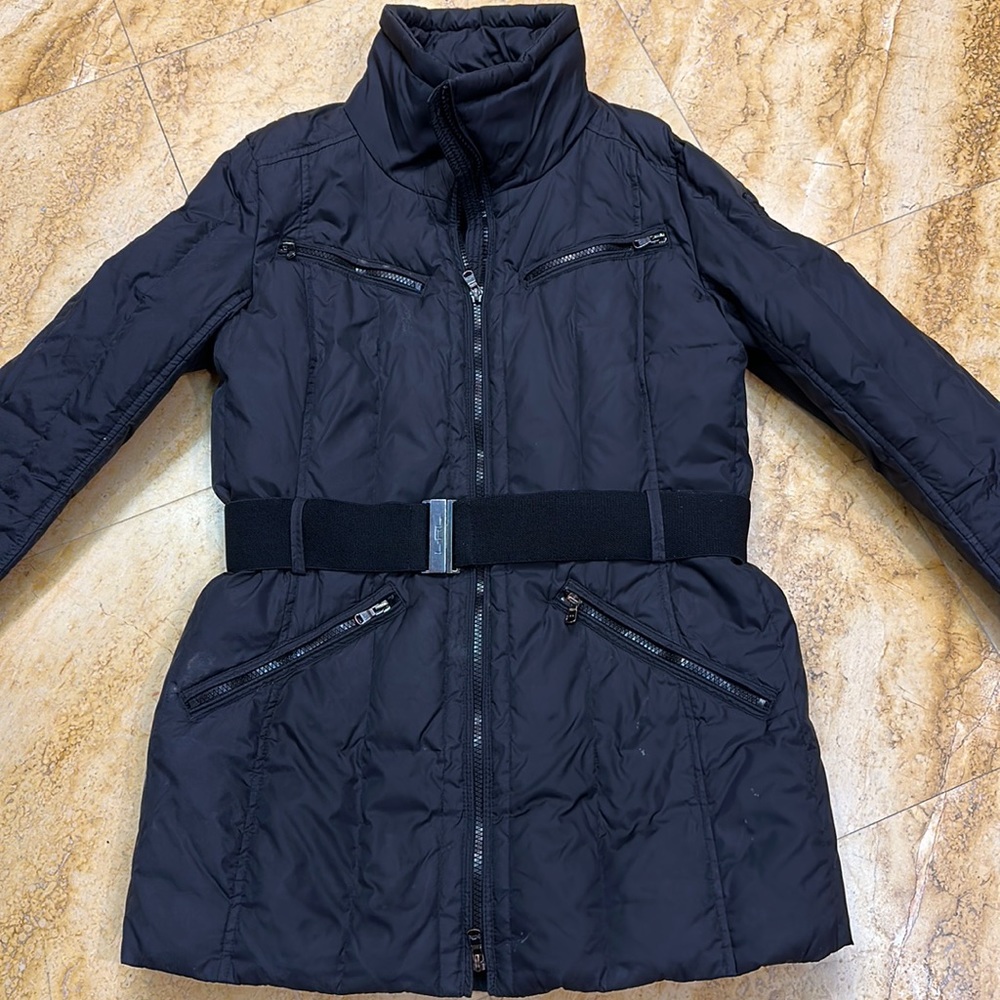 Women’s black puffer jacket with a belt